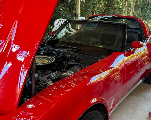 Red classic car with its bonnet open for auto electrical diagnostics and repairs in Brisbane
